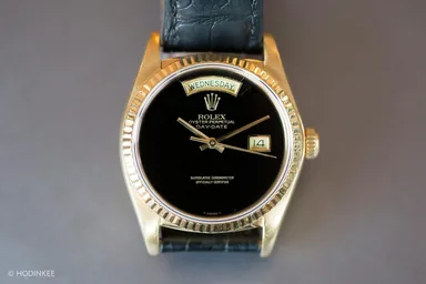 Rolex Day-Date — yellow gold, onyx dial — source photo
