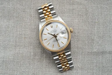 Rolex Datejust — two-tone, Tiffany-stamped dial — source photo