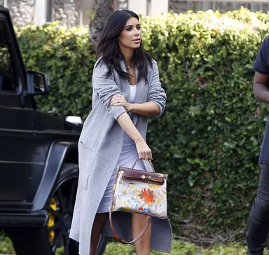 Hermès handbag — painted by North West — source photo