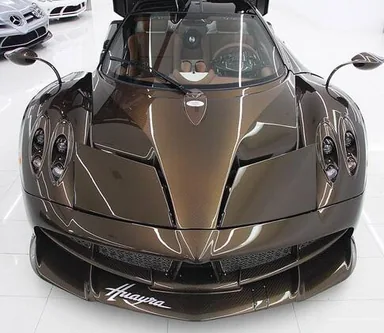 Pagani Huayra Hermès Edition — one-off, brown carbon body — source photo